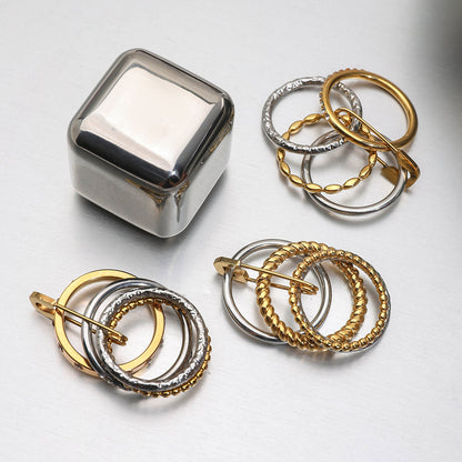 Anillos Clásicos de Oro y Plata con Diseño de Clip de Papel Multicapa