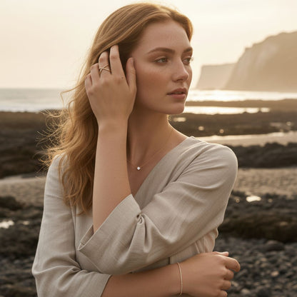 Elegant Gold-Colored X-Shaped Ring with Sparkling Crystals - Adjustable Stainless Steel